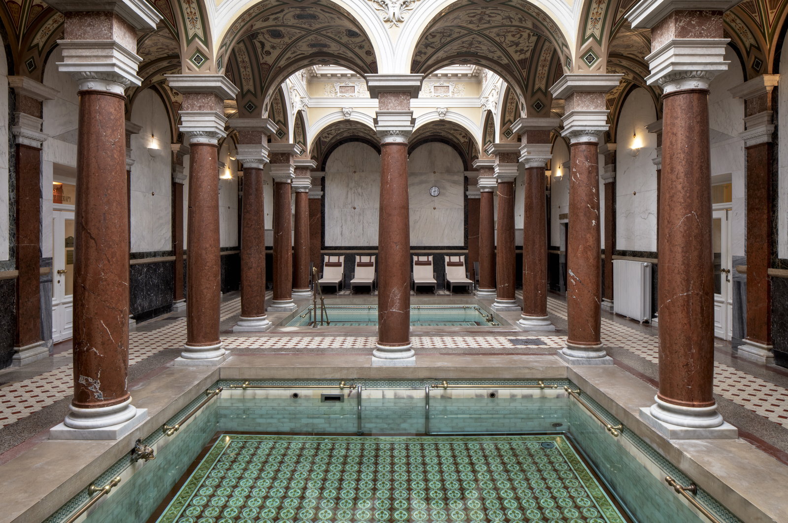 Roman Baths at Nové Lázně: mineral-water pool between red marble columns